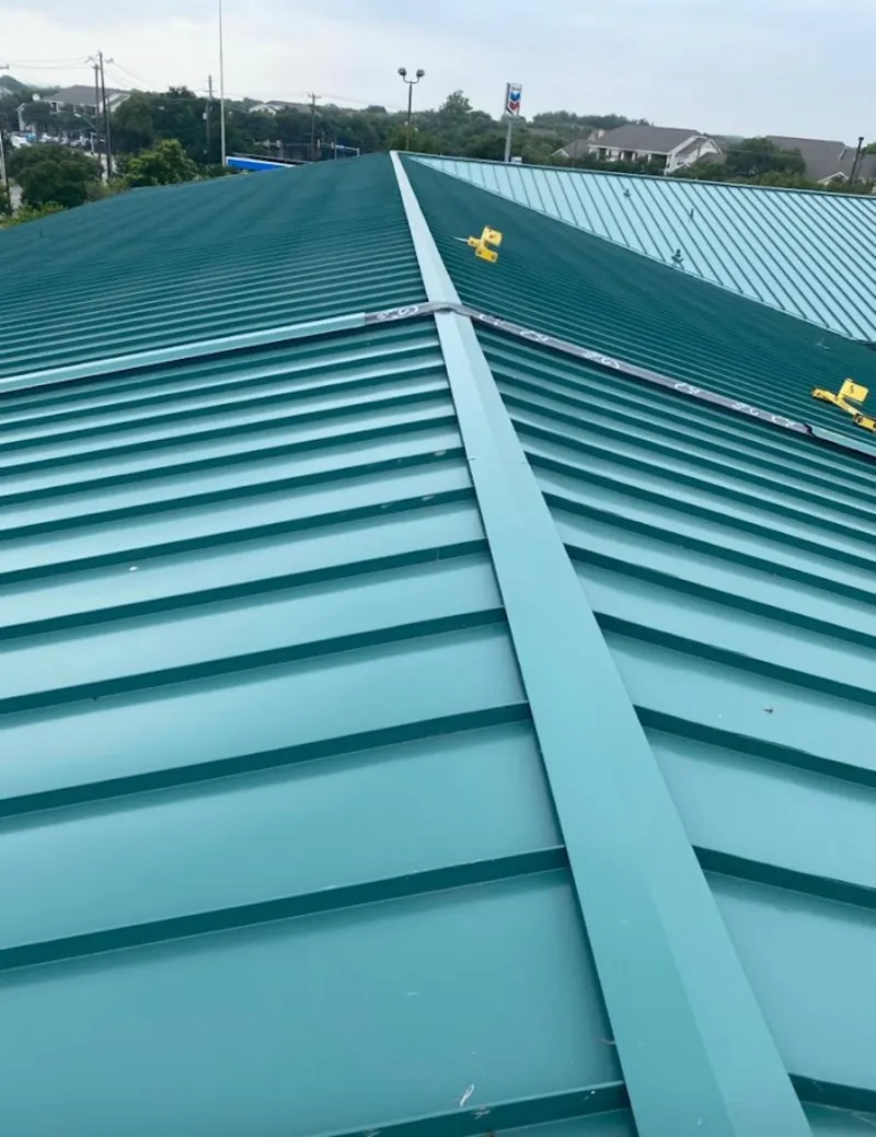 Green commercial metal roof ridge and valley for Metal Roof Repair in Versailles
